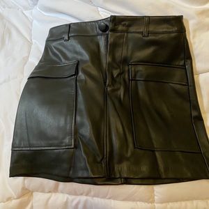 Black leather mini skirt